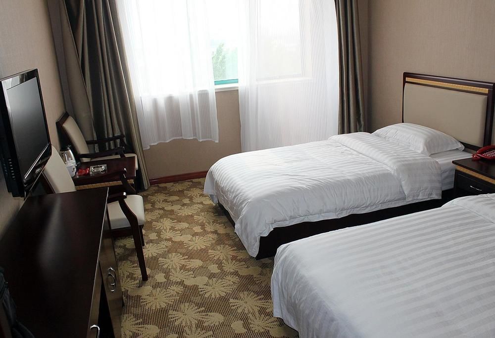 China Rushan Champs Elysees Hotel Shandong Exterior photo